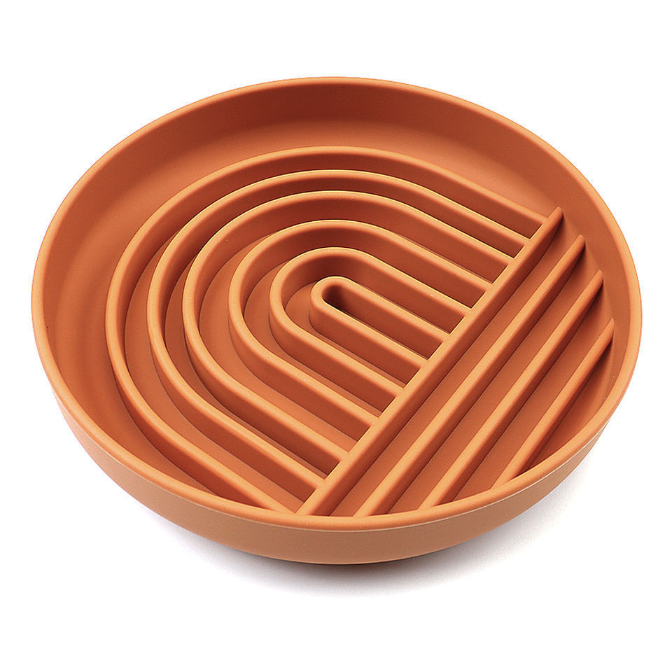 Terracotta colored slow feeder dog bowl